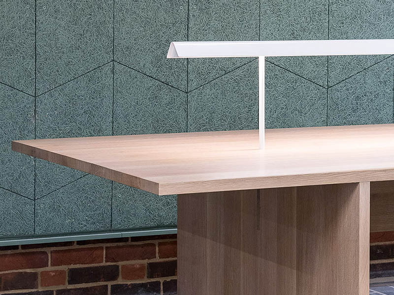 Minimalist meeting table with elegant built in light