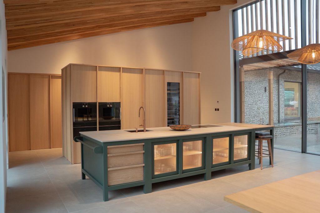 Oak kitchen with green painted island