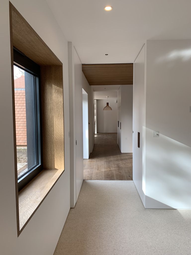 view from master bedroom with timber window reveal
